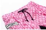 MIP TAPED SIDE STRIPE TRACK PANTS IN PINK - boopdo