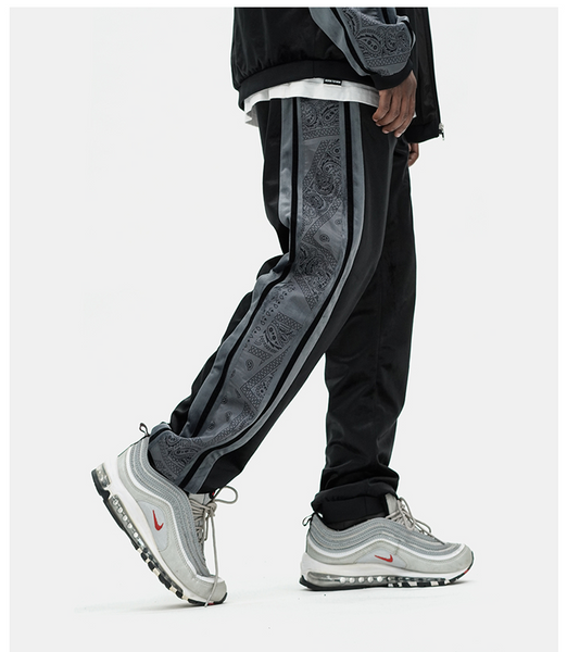 VORTEX BONSEYA BTW CASHEW FLOWER STRIPED VELVET TRACKPANTS - boopdo