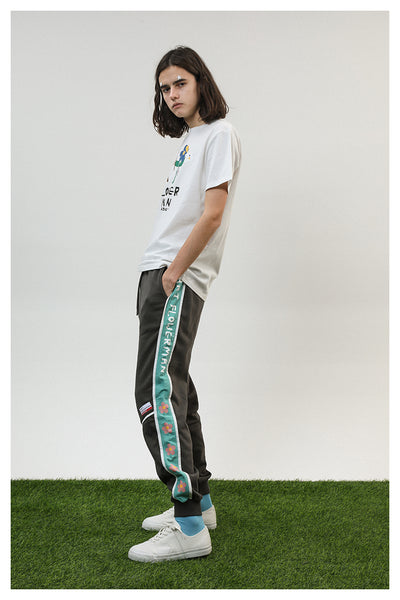 TYAKASHI TRACK PANTS WITH TAPING DESIGN - boopdo