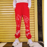 MAXIMARTIN MIXED PATTERN NEW YEAR RELAXED JOGGER PANTS IN RED - boopdo