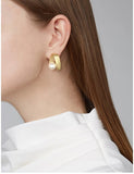 UZL DESIGN ABSTRACT EARRINGS WITH PEARL DETAIL IN GOLD PLATE - boopdo