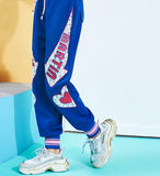 MAXMARTIN BLUE JOGGER PANTS WITH LOGO AND HEART PATCHED - boopdo