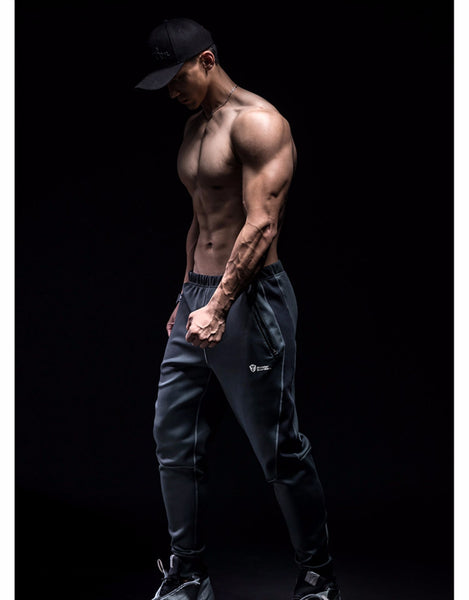 MONSTER GUARDIANS PANELED TRACK PANTS IN GREY - boopdo