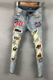 DSTWUPS AMR RIPPED PATCH BADGE RETRO DENIM JEANS IN LIGHT BLUE - boopdo
