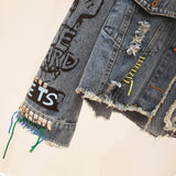 ALEYA NOIR GRAFFITI ARTWORK DENIM JEAN JACKET WITH RIVETS - boopdo