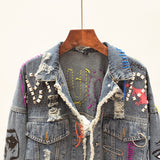 ALEYA NOIR GRAFFITI ARTWORK DENIM JEAN JACKET WITH RIVETS - boopdo