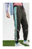 TYAKASHI TRACK PANTS WITH TAPING DESIGN - boopdo